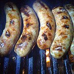 Cooking bratwurst on my Weber Genesis.